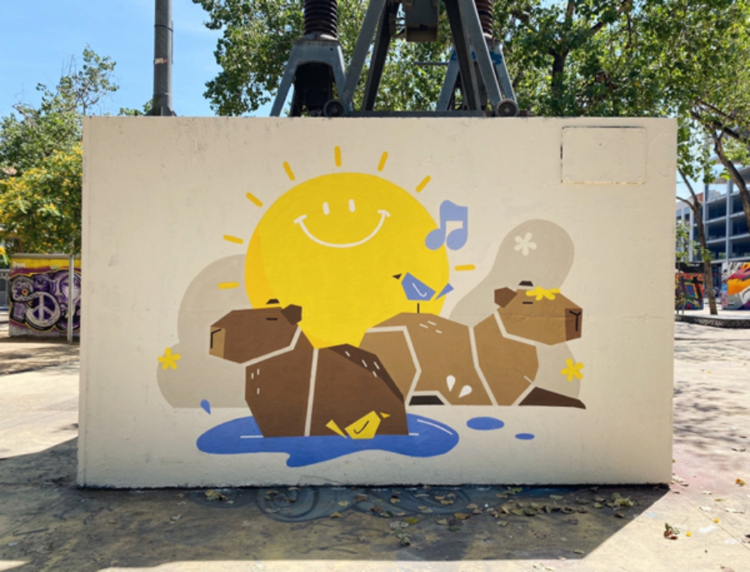 Wallspot - Capibaras al sol